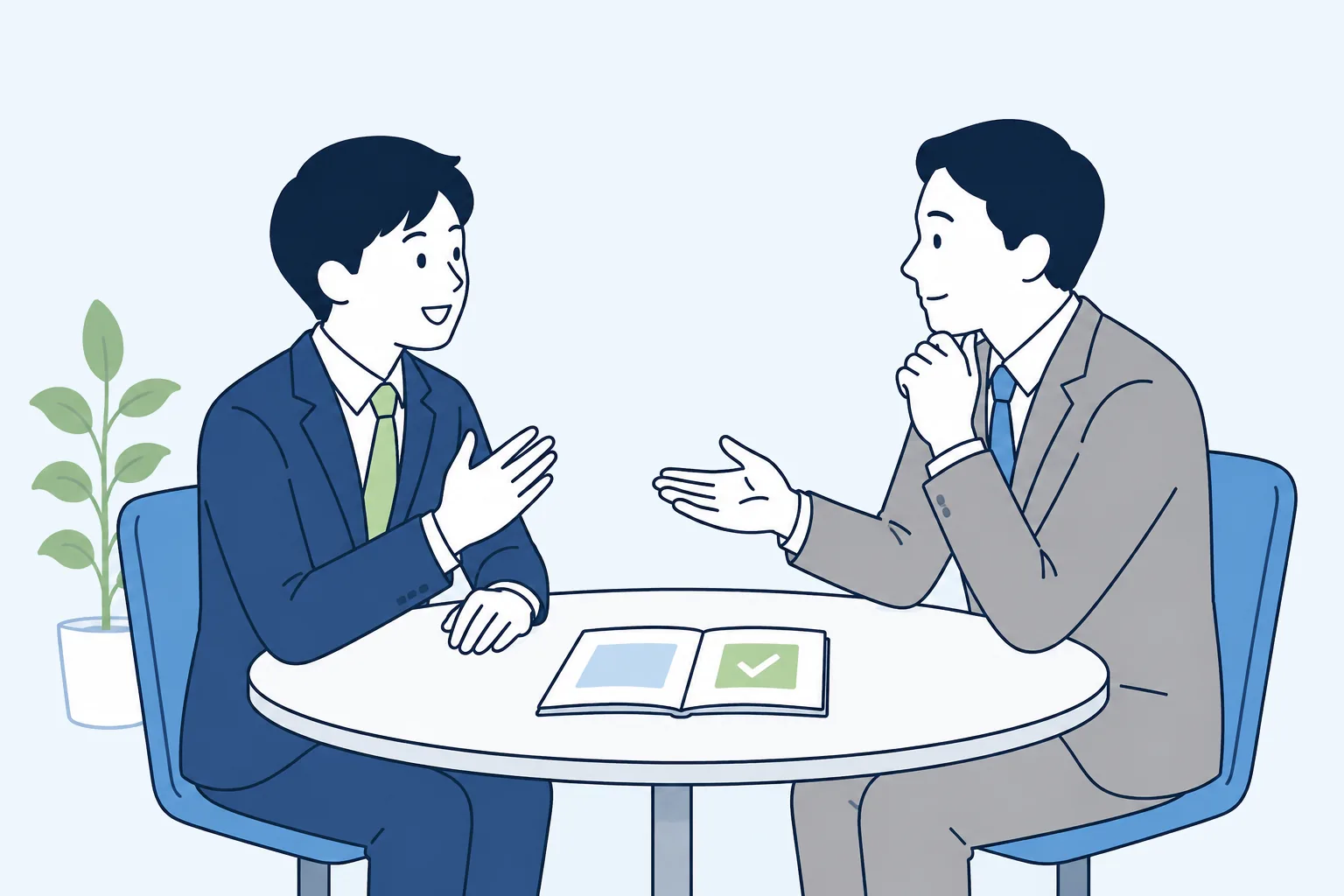 管理職が部下を育成し面談する様子